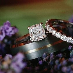 Geneve Jewelers - Our wedding rings purchased at Geneve. We love them so much!