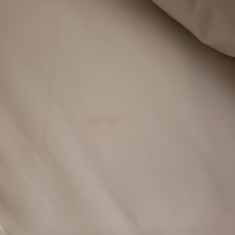 Stain on the sheets. Stain on the sheets.