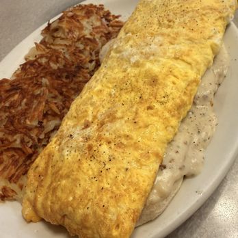 Oswego Family Restaurant - Farmers omelette, cheese omelette atop biscuits and gravy, add a side of hashbrowns. - Breakfast & Brunch Near Me - Oswego, Illinois Oswego Family Restaurant - Farmers omelette, cheese omelette atop biscuits and gravy, add a side of hashbrowns. - Breakfast & Brunch Near Me - Oswego, Illinois
