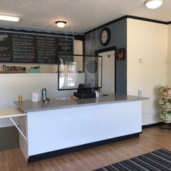 The Happy Belly Deli - Clean & neat front counter - menu board