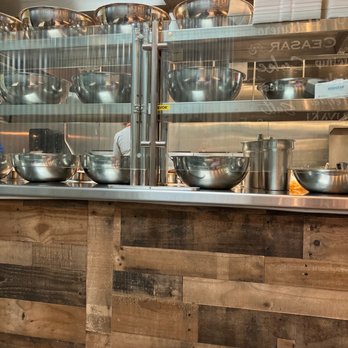Wing Bros - a kitchen counter with many pots and pans on it - Chicken Wings Near Me - Brentwood, California Wing Bros - a kitchen counter with many pots and pans on it - Chicken Wings Near Me - Brentwood, California