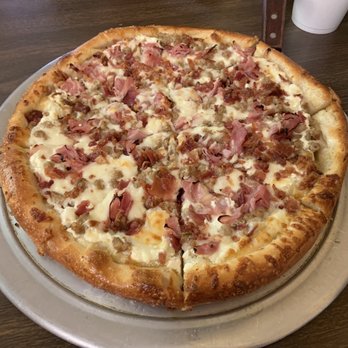 Rocco's Pizza - a pizza on a plate - Pizza Near Me - Fort McCoy, Florida Rocco's Pizza - a pizza on a plate - Pizza Near Me - Fort McCoy, Florida