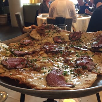 Mistral - Beef tenderloin, mashed potato, and white truffle oil thin crust pizza - French Near Me - Boston, Massachusetts Mistral - Beef tenderloin, mashed potato, and white truffle oil thin crust pizza - French Near Me - Boston, Massachusetts