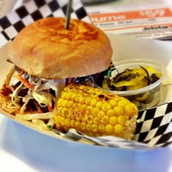 Sneaky Pickle - Pulled pork and slaw bun, with chipotle-buttered corn and pickles