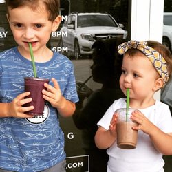 Clean Juice - Little sister wants some of big brother's Wild one smoothie