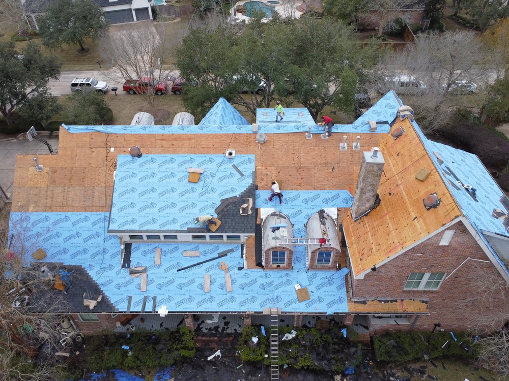 Slide of Dynasty Roofing and Construction