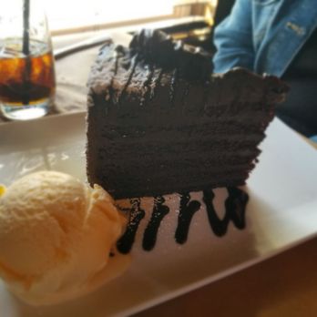 Lucky Dog Tavern - Their chocolate cake slice is HUGE! Ice cream added. Definitely a sharing dessert. - American Near Me - North Smithfield, Rhode Island Lucky Dog Tavern - Their chocolate cake slice is HUGE! Ice cream added. Definitely a sharing dessert. - American Near Me - North Smithfield, Rhode Island