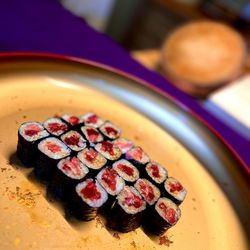 SHINGO - Salmon/Tuna sushi bites sprinkled with the perfect amount of soy sauce.