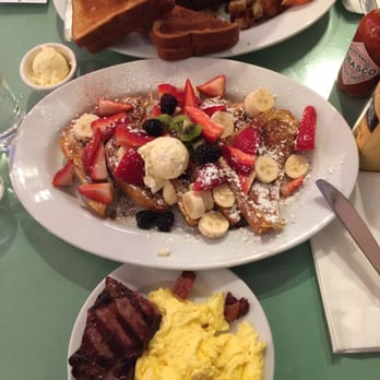 Mo's Grill - French Toast with organic fruit and steak and eggs split in half. - Burgers Near Me - San Francisco, California