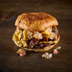 Taco Bamba Fairfax - Taco Bamba's burger with brisket chop chop patty, American cheese, chili relish, Bamba smoke sauce.