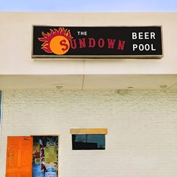 The Sundown Bikini Bar - The Sundown Bikini Bar, front entrance. "Look for the orange door!"