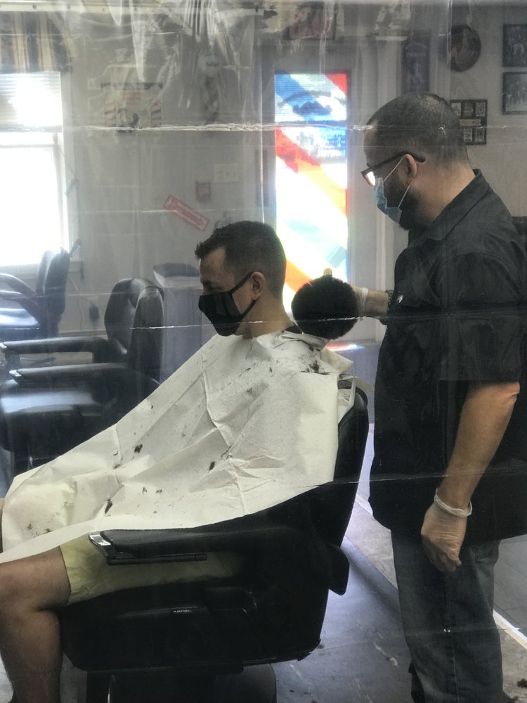 The Neighborhood Barbershop Logo