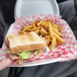 Grabby Shack - Club house sandwich with golden fries!