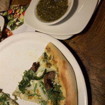 California Pizza Kitchen - Salsa verde served aside carne asada pizza - Pizza Near Me - Chino Hills, California California Pizza Kitchen - Salsa verde served aside carne asada pizza - Pizza Near Me - Chino Hills, California