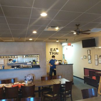 Eat Thai, Thai Eatery - a man standing at the counter - Thai Near Me - West Des Moines, Iowa Eat Thai, Thai Eatery - a man standing at the counter - Thai Near Me - West Des Moines, Iowa
