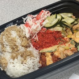Steamed White Rice, Spicy Tuna, salmon, cooked crab, cucumbers, Cucumber Salad, octopus, spicy flakes and spicy Mayo. Steamed White Rice, Spicy Tuna, salmon, cooked crab, cucumbers, Cucumber Salad, octopus, spicy flakes and spicy Mayo.