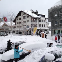 Hotel Schweizerhof Engelberg  - Cleaning the snow in the morning