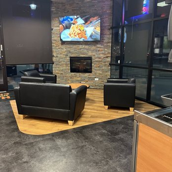 Halls Honey Fried Chicken - Tv area with group seating - Chicken Wings Near Me - Carrollton, Texas
