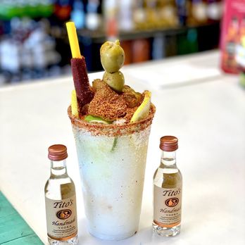 Ravi’s liquor - a bloody drink with olives and a straw - Beer, Wine & Spirits Near Me - Lubbock, Texas Ravi’s liquor - a bloody drink with olives and a straw - Beer, Wine & Spirits Near Me - Lubbock, Texas