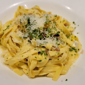 Mille Pâtes - a plate of pasta with parmesan cheese - Italian Near Me - Mont-Tremblant, Quebec Mille Pâtes - a plate of pasta with parmesan cheese - Italian Near Me - Mont-Tremblant, Quebec