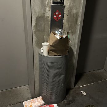 University House Midtown - Trash cluttering all common spaces - have to dodge trash to click the elevator button - University Housing Near Me - Atlanta, Georgia
