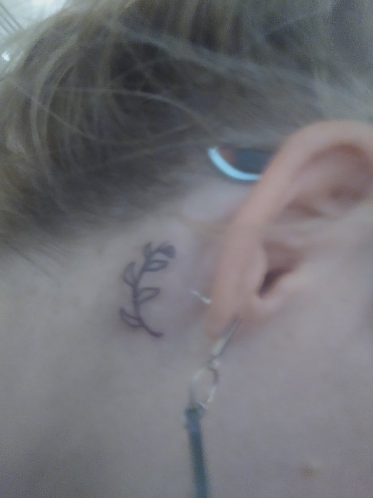 Free World Tattoo Logo