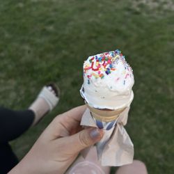 Vanilla soft serve with rainbow sprinkles