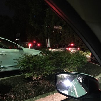 McDonald's - a side view mirror of a car at night - Burgers Near Me - Thornwood, New York