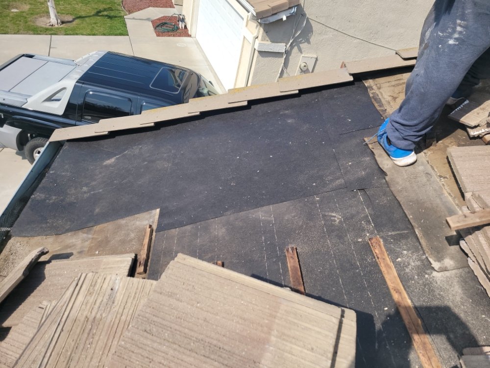 Slide of Franks Roof  Repairs