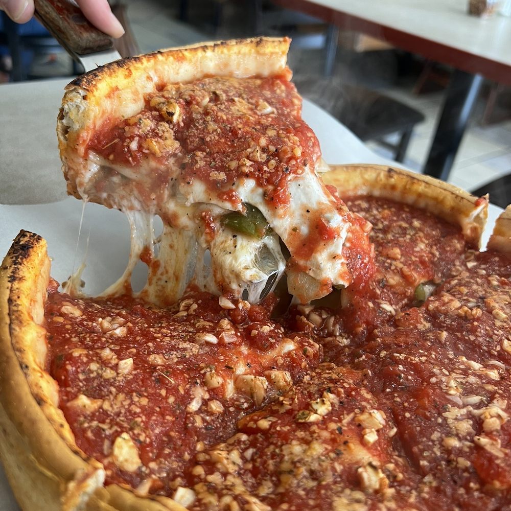 Tortugas Pizza - The cheese pull!!! - Pizza Near Me - Birmingham, Alabama Tortugas Pizza - The cheese pull!!! - Pizza Near Me - Birmingham, Alabama