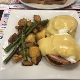 Eggs Benedict with hash and asparagus Eggs Benedict with hash and asparagus