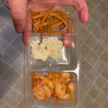 Soo Rah - This is the sides now. Tablespoon of mashed potatoes, onions, and 4 tiny pieces of Kimche. It's being advertised as still the full meal. - Korean Near Me - Medford, Oregon Soo Rah - This is the sides now. Tablespoon of mashed potatoes, onions, and 4 tiny pieces of Kimche. It's being advertised as still the full meal. - Korean Near Me - Medford, Oregon