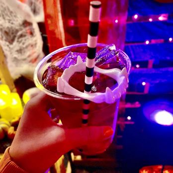The Lafayette Bar - a person holding a drink - Bars Near Me - Easton, Pennsylvania The Lafayette Bar - a person holding a drink - Bars Near Me - Easton, Pennsylvania