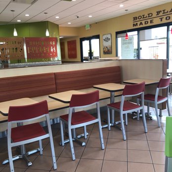 Del Taco - tables and chairs in a restaurant - Mexican Near Me - Foothill Ranch, California Del Taco - tables and chairs in a restaurant - Mexican Near Me - Foothill Ranch, California