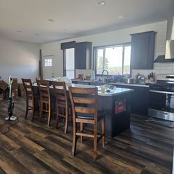 Shanklin's of South Dakota - The glue down floor is the way to go. Repairs are easier and the floor is solid with a sub floor under it.