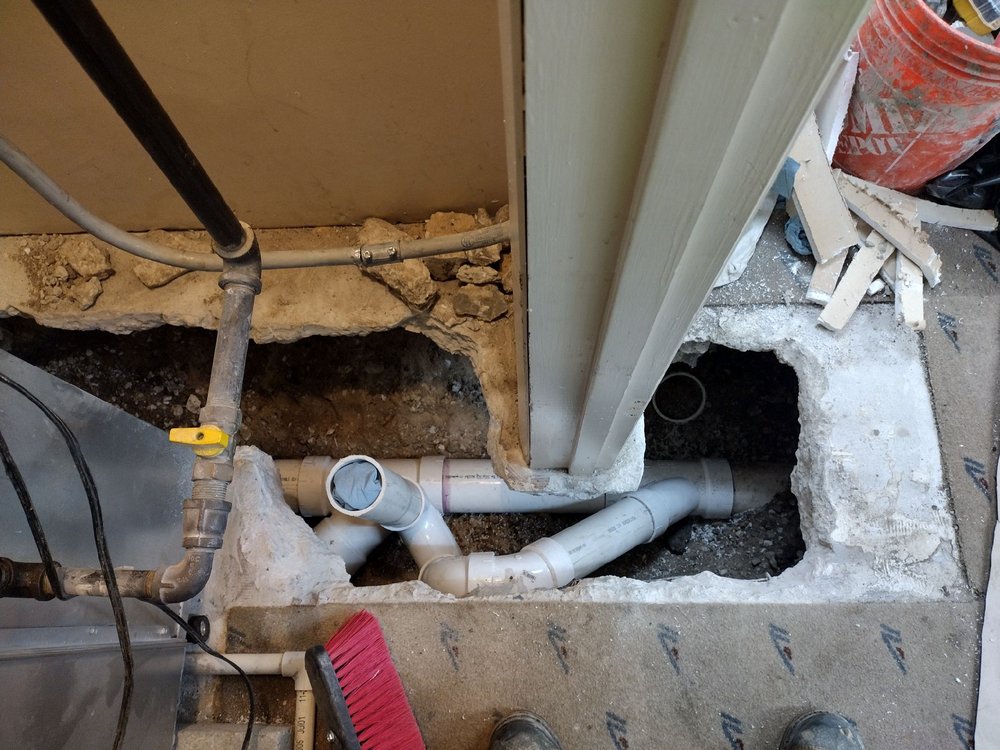 Slide of Suburban Plumbing Experts