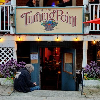 Turning Point Cafe - a man sitting on the sidewalk - American Near Me - Piermont, New York Turning Point Cafe - a man sitting on the sidewalk - American Near Me - Piermont, New York