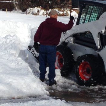 C and H Concrete - Skidsteer clearing snow with special snow bucket - Snow Removal Near Me C and H Concrete - Skidsteer clearing snow with special snow bucket - Snow Removal Near Me