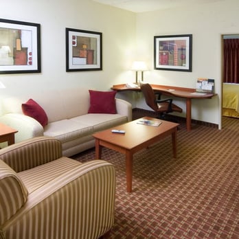 Quality Suites - Guest Suite - Living Room - Hotels Near Me - Lansing, Michigan Quality Suites - Guest Suite - Living Room - Hotels Near Me - Lansing, Michigan