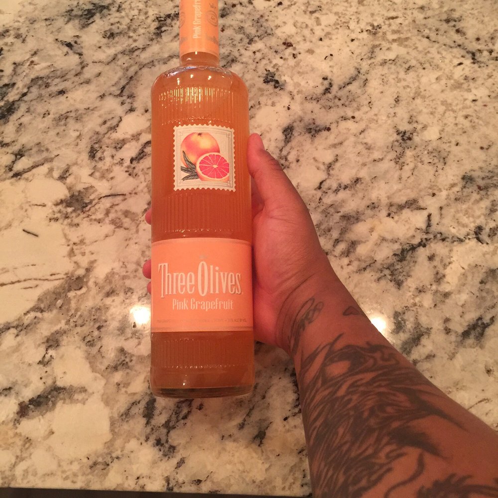 ABC Beverages - a hand holding a bottle of orange juice - Beer, Wine & Spirits Near Me - Birmingham, Alabama ABC Beverages - a hand holding a bottle of orange juice - Beer, Wine & Spirits Near Me - Birmingham, Alabama