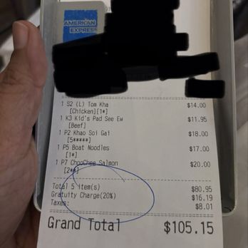 Thai Lada - A restaurant receipt from Thai Lada in Austin, TX, displays five ordered items including Tom Kha, Kid's Pad See Ew, Khao Soi Gai, Boat Noodles, and ChooChoo Salmon, with prices ranging from $11.95 to $20.00. The receipt shows a 20% gratuity charge and taxes, with a total of $105.15. The receipt is held by a hand and partially obscures a menu or sign at the top, with a blacked-out section and an American Express card visible. - Thai Near Me - Austin, Texas