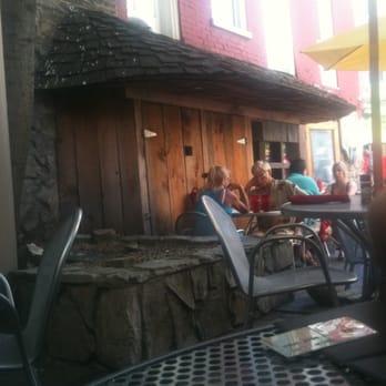 Chandler's - the patio at chandlers - cozy and sheltered from the sun (and the tourists :)) - New American Near Me - Petoskey, Michigan