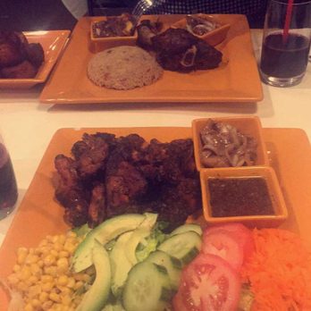 Nailah's kitchen - Mechoui (Lamb) at the top and the Dibi Chicken on the bottom; both very good. And that salad/dressing combo was the bomb! - Senegalese Near Me - Baltimore, Maryland