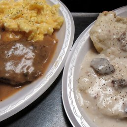 two plates of food on a tray two plates of food on a tray
