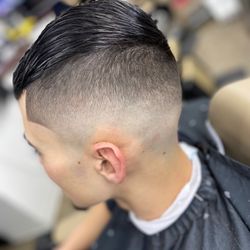 Julio's Barbershop & Hair Salon - Brian Barber is the number one, ask for it. It's always available