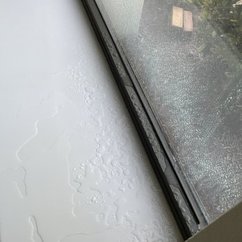 Hampton Inn South Hill - Water dripping from above the window into the AC unit on a sunny morning - Hotels Near Me - South Hill, Virginia Hampton Inn South Hill - Water dripping from above the window into the AC unit on a sunny morning - Hotels Near Me - South Hill, Virginia