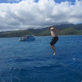 Oahu Diving - Jumping off the roof of the boat. - Scuba Diving Near Me - Honolulu, Hawaii Oahu Diving - Jumping off the roof of the boat. - Scuba Diving Near Me - Honolulu, Hawaii