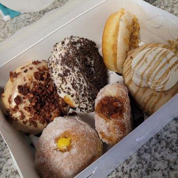 Blondie's Doughnuts - Top L-R: Maple Bacon, Cookies and Cream, Snickerdoodle Bottom L-R: Lemon Drop, Carrot Cake Jam, Maple Bulleit Bourbon - Donuts Near Me - Edgewater, Maryland Blondie's Doughnuts - Top L-R: Maple Bacon, Cookies and Cream, Snickerdoodle Bottom L-R: Lemon Drop, Carrot Cake Jam, Maple Bulleit Bourbon - Donuts Near Me - Edgewater, Maryland
