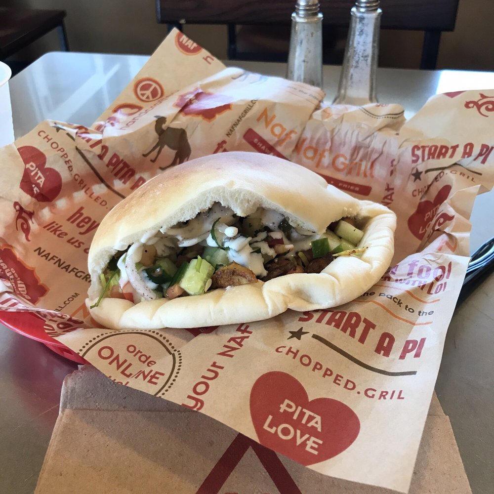 Naf Naf Grill - Chicken Shawarma - $7.20 Great flavors and fresh pita. Good sized for a dinner - Middle Eastern Near Me - Glenview, Illinois Naf Naf Grill - Chicken Shawarma - $7.20 Great flavors and fresh pita. Good sized for a dinner - Middle Eastern Near Me - Glenview, Illinois