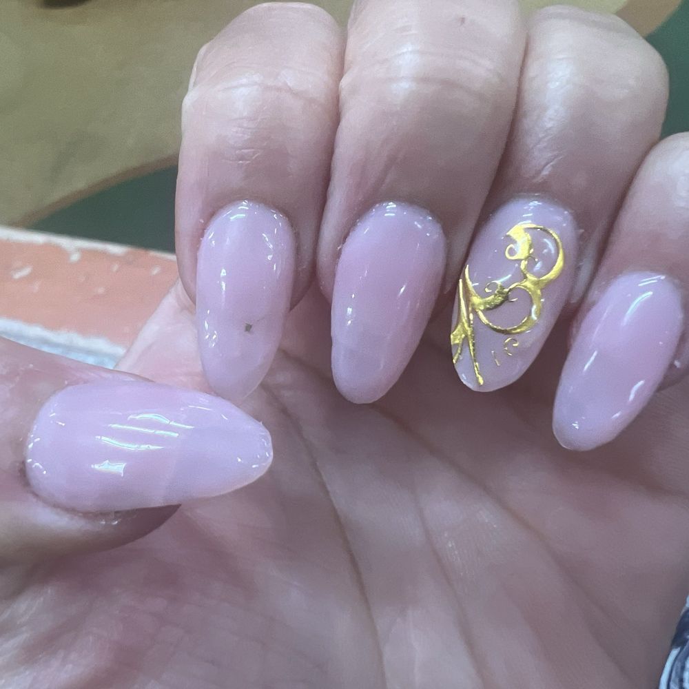 Gel color coats are uneven. A spot on first nail. Design sticker bulky and bubbly. Gel color coats are uneven. A spot on first nail. Design sticker bulky and bubbly.